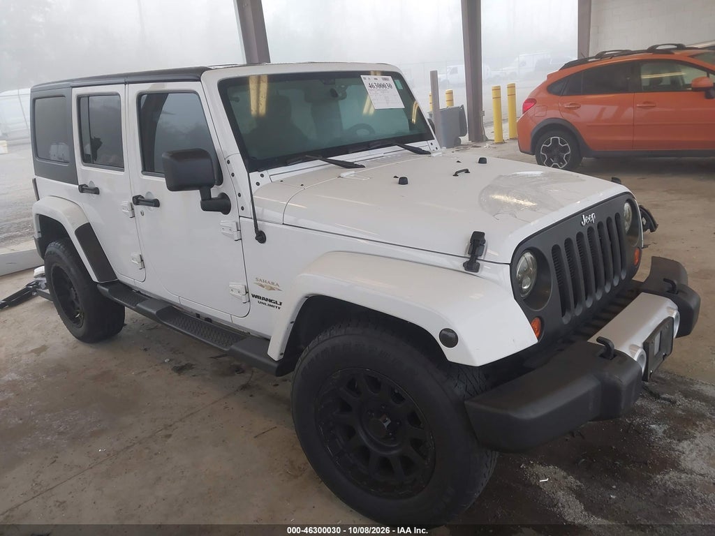 2013 Jeep Wrangler Unlimited Sahara photo 1