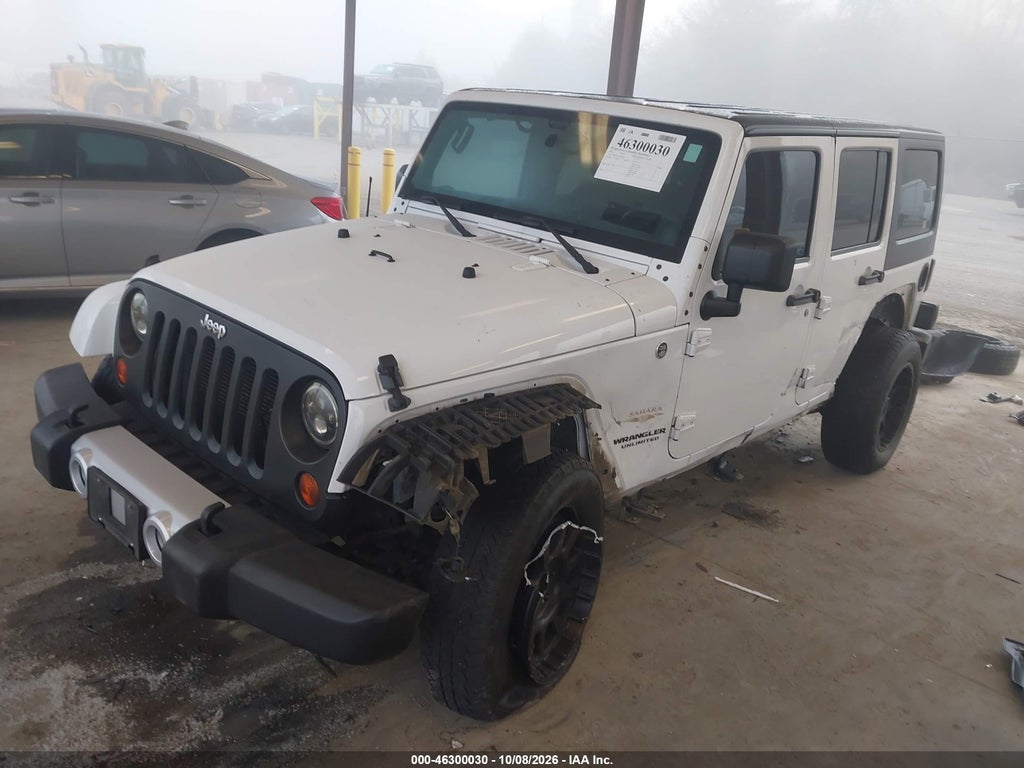 2013 Jeep Wrangler Unlimited Sahara photo 2