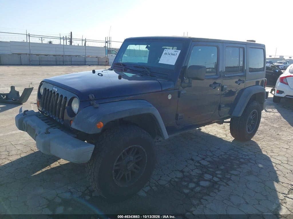 2013 Jeep Wrangler Unlimited Sport photo 2