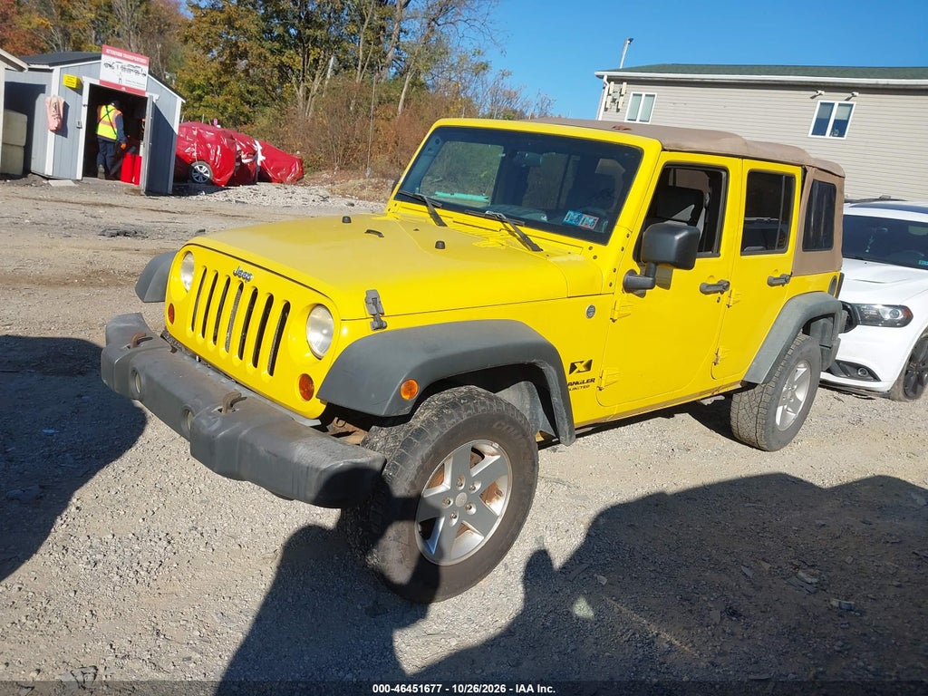 2009 Jeep Wrangler Unlimited X photo 2
