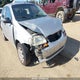 KL5TJ66606B547166 2006 Suzuki Swift auction photo thumbnail 6