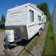 2TTRT2306YR000452 2000 Travelaire Rustler auction photo thumbnail 2