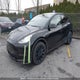 7SAYGDEE5NF493003 2022 Tesla Model Y auction photo thumbnail 2