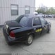 2FAFP74W4XX115098 1999 Ford Crown Victoria Lx auction photo thumbnail 4