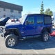 1C4HJXDGXKW677847 2019 Jeep Wrangler Unlimited Sport S 4X4 auction photo thumbnail 14