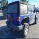 1C4HJXDGXKW677847 2019 Jeep Wrangler Unlimited Sport S 4X4 auction photo thumbnail 4