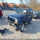 1J4FF47S61L558985 2001 Jeep Cherokee Sport auction photo thumbnail 2