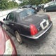 1LNHM81W3YY784675 2000 Lincoln Town Car Executive auction photo thumbnail 3