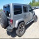 1C4HJWEG5EL143315 2014 Jeep Wrangler Unlimited Sahara auction photo thumbnail 4
