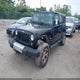 1C4HJWEG8EL143289 2014 Jeep Wrangler Unlimited Sahara auction photo thumbnail 2