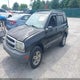 2CNBE13C036934432 2003 Chevrolet Tracker Hard Top Base auction photo thumbnail 2