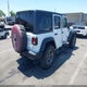 1C4HJXDG9KW501789 2019 Jeep Wrangler Unlimited Sport S 4X4 auction photo thumbnail 4