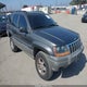 1J4GX48S42C170624 2002 Jeep Grand Cherokee Laredo auction photo thumbnail 1