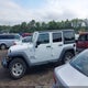 1C4HJWDG7GL166003 2016 Jeep Wrangler Unlimited Sport auction photo thumbnail 14