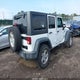 1C4HJWDG7GL166003 2016 Jeep Wrangler Unlimited Sport auction photo thumbnail 4