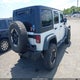 1C4BJWDG0EL108138 2014 Jeep Wrangler Unlimited Sport auction photo thumbnail 4