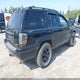 1J4GW58NXYC309294 2000 Jeep Grand Cherokee Limited auction photo thumbnail 4