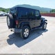 1J4HA5H12BL619544 2011 Jeep Wrangler Unlimited Sahara auction photo thumbnail 4