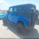 1C4BJWEGXEL254318 2014 Jeep Wrangler Unlimited Altitude auction photo thumbnail 3