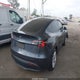 5YJYGDED6MF103805 2021 Tesla Model Y Standard Range Rear-Wheel Drive auction photo thumbnail 4