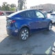 7SAYGDEE7PF621275 2023 Tesla Model Y Awd/Long Range Dual Motor All-Wheel Drive auction photo thumbnail 4
