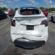 7SAYGDEF4RA288834 2024 Tesla Model Y Performance Dual Motor All-Wheel Drive auction photo thumbnail 6