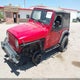 1J4FA49S0YP731544 2000 Jeep Wrangler Sport auction photo thumbnail 2