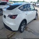 7SAYGDEE1PF599774 2023 Tesla Model Y Awd/Long Range Dual Motor All-Wheel Drive auction photo thumbnail 4