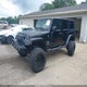 1J4GA59149L700985 2009 Jeep Wrangler Unlimited Sahara auction photo thumbnail 2