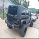 1J4GA59149L700985 2009 Jeep Wrangler Unlimited Sahara auction photo thumbnail 4