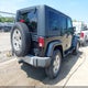 1J4GA59138L640048 2008 Jeep Wrangler Unlimited Sahara auction photo thumbnail 4