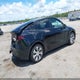 7SAYGAEE9PF931216 2023 Tesla Model Y Awd/Long Range Dual Motor All-Wheel Drive auction photo thumbnail 4