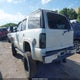 1GNEK13Z62J252243 2002 Chevrolet Tahoe Lt auction photo thumbnail 3