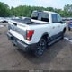 1N6AA1ED3PN104141 2023 Nissan Titan Platinum Reserve 4X4 auction photo thumbnail 4