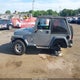 1J4FA49S3YP774212 2000 Jeep Wrangler Sport auction photo thumbnail 14