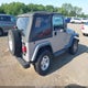 1J4FA49S3YP774212 2000 Jeep Wrangler Sport auction photo thumbnail 4