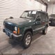 1J4FF48SXYL116106 2000 Jeep Cherokee Sport auction photo thumbnail 2