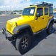 1C4BJWDG5FL565948 2015 Jeep Wrangler Unlimited Sport auction photo thumbnail 2