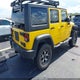 1C4BJWDG5FL565948 2015 Jeep Wrangler Unlimited Sport auction photo thumbnail 4