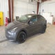7SAYGDEE5PA203388 2023 Tesla Model Y Awd/Long Range Dual Motor All-Wheel Drive auction photo thumbnail 2
