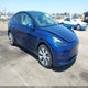 7SAYGDEEXPF892427 2023 Tesla Model Y Awd/Long Range Dual Motor All-Wheel Drive auction photo thumbnail 1