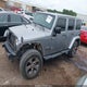 1C4BJWEGXGL280016 2016 Jeep Wrangler Unlimited Sahara auction photo thumbnail 15