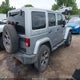1C4BJWEGXGL280016 2016 Jeep Wrangler Unlimited Sahara auction photo thumbnail 4