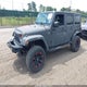 1J4HA5H19AL146028 2010 Jeep Wrangler Unlimited Sahara auction photo thumbnail 2