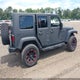 1J4HA5H19AL146028 2010 Jeep Wrangler Unlimited Sahara auction photo thumbnail 4