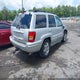 1J8GW68J84C366556 2004 Jeep Grand Cherokee Overland auction photo thumbnail 4