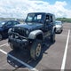 1C4HJWDG3GL235804 2016 Jeep Wrangler Unlimited Sport auction photo thumbnail 2