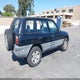 JT3GP10V6X7061242 1999 Toyota Rav4 auction photo thumbnail 4