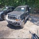 1J4G258S9XC712540 1999 Jeep Grand Cherokee Laredo auction photo thumbnail 2