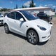 7SAYGDEE2PF877078 2023 Tesla Model Y Awd/Long Range Dual Motor All-Wheel Drive auction photo thumbnail 1